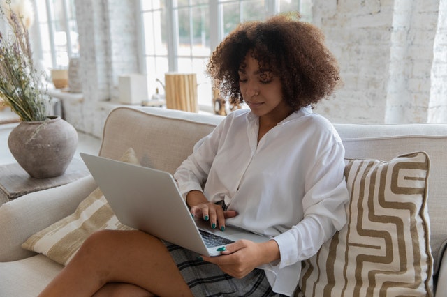 Woman sitting at a laptop