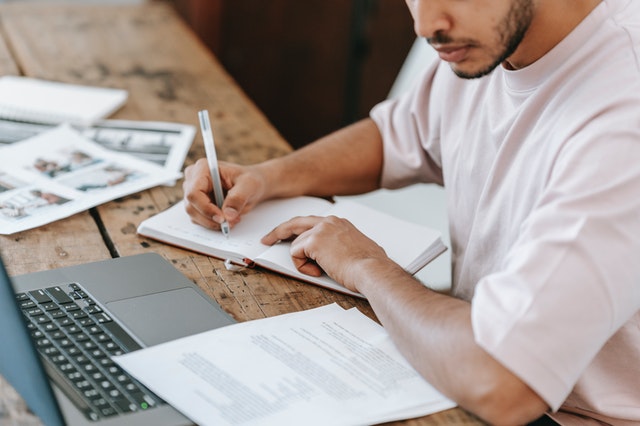 Man sitting at a laptop